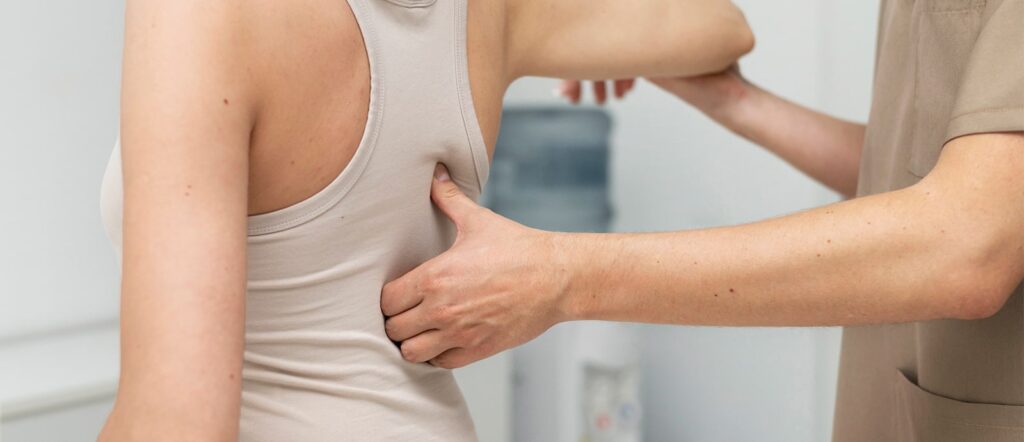 Chiropractic care Jimboomba chiropractor treating a tradie and a desk worker for back strain
